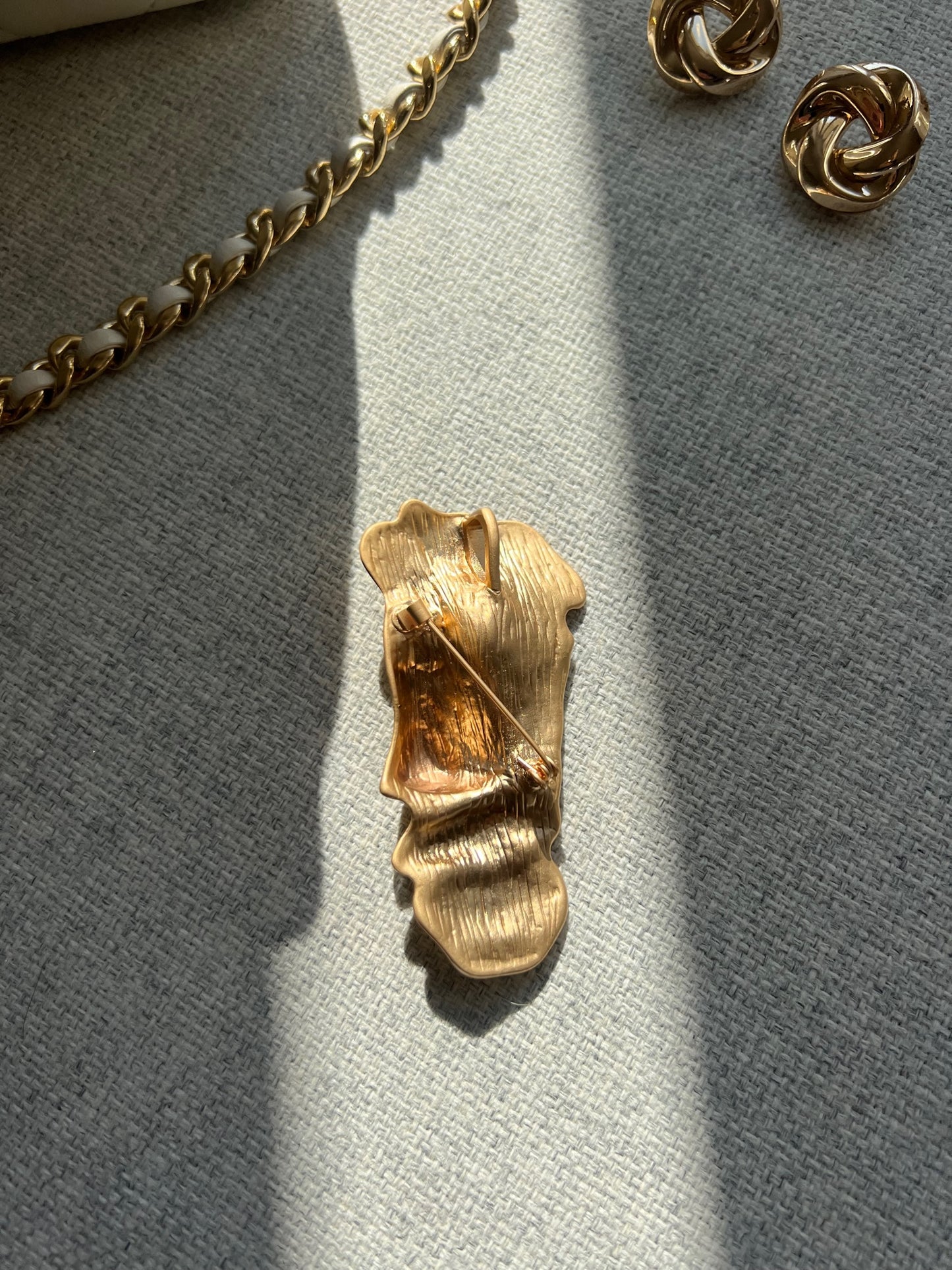 Broche visage