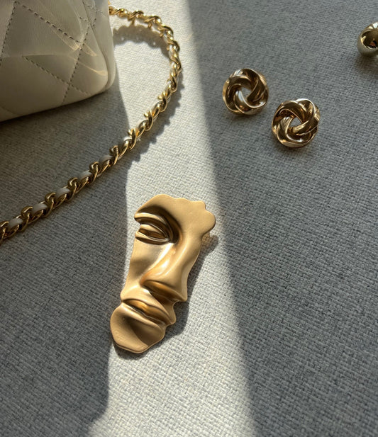 Broche visage